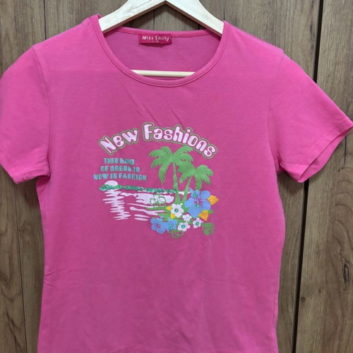 Pink short-sleeve blouse used size L/XL with designs