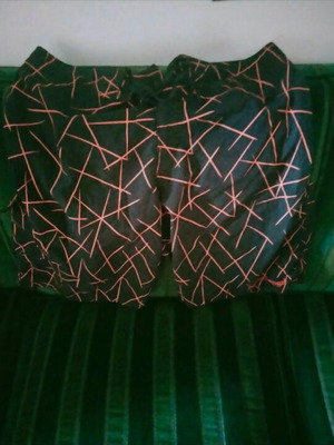 Demon men's swimwear size 34 used, black and orange