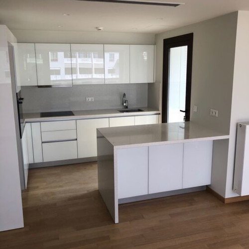 White lacquer kitchen with glass and countertop new