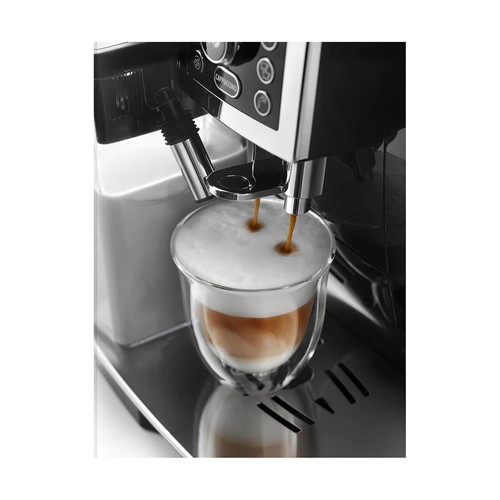 Espresso coffee maker like new with coffee beans and milk frother