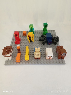 Ninjago and Minecraft figures set of 8 like new with weapons