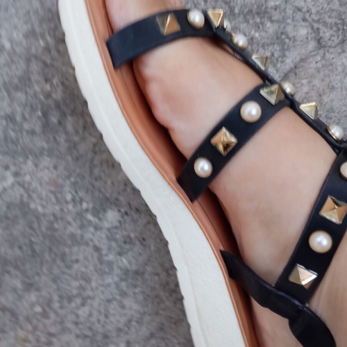 Brilliant black flat sandals with studs and pearls