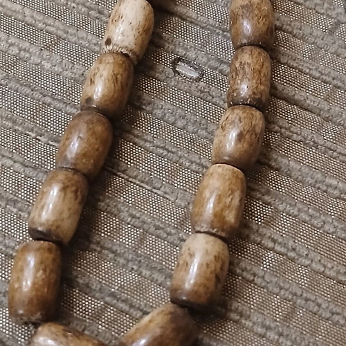 Worry beads made of bone used with oriental elements