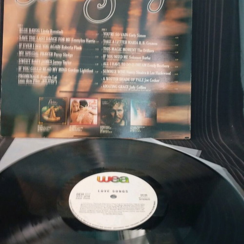 Love Songs vinyl record used in very good condition