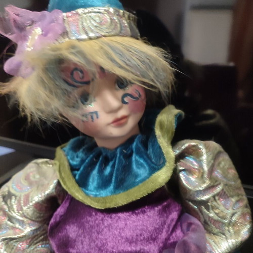 Harlequin porcelain music doll Symphony like new