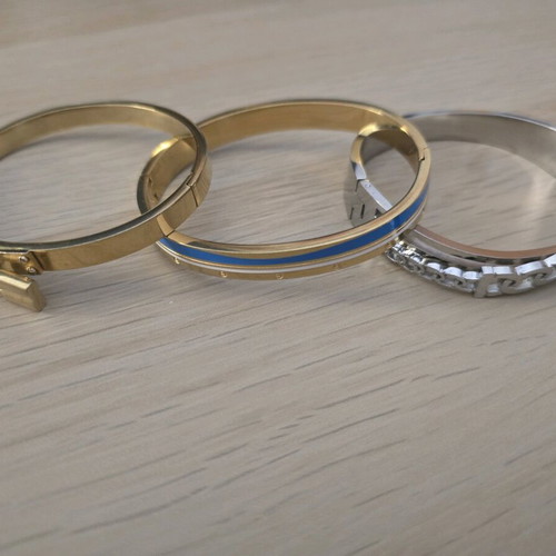 Stainless steel bracelets like new, set of 3, gold and silver colors