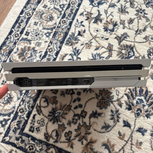 PlayStation 4 Pro Destiny Edition console with two controllers