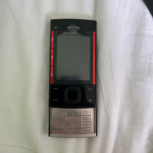 Nokia X3 used phone for parts without battery and back cover