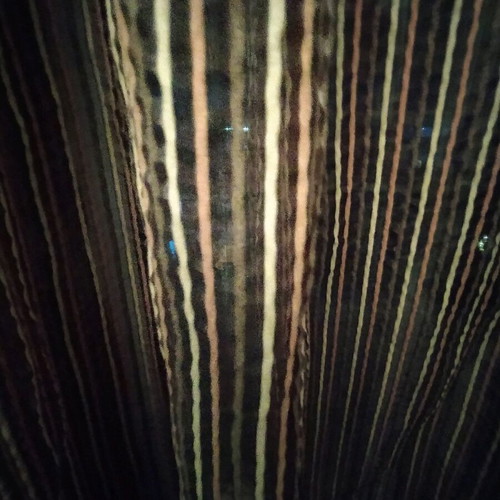 Curtain for window in dark brown shades with beige stripes like new