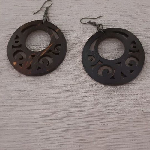Wooden earrings used with carved design, brown