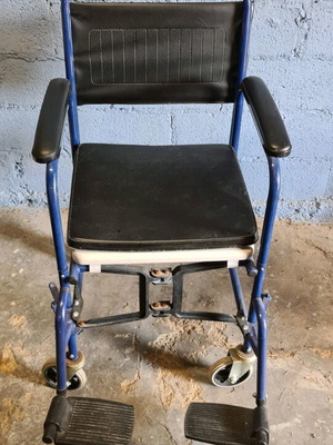 Wheelchair with commode like new