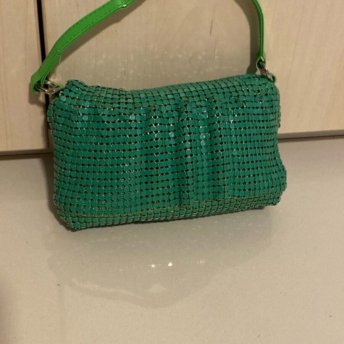 Migato green hand bag like new, satin interior
