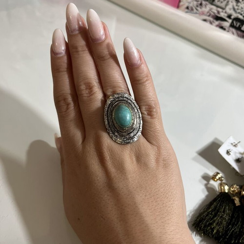 Silver ring with turquoise stone like new