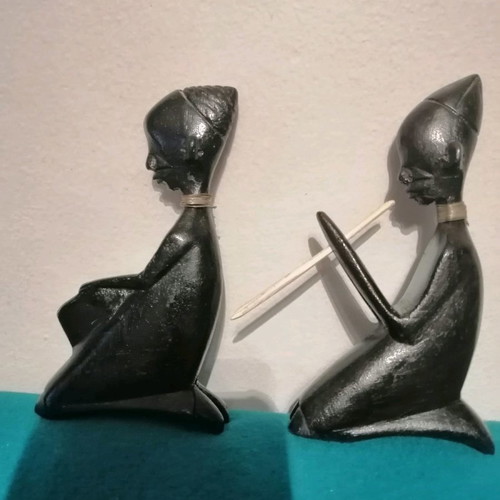 Ebony woodcarving set used, two African figures playing musical instruments