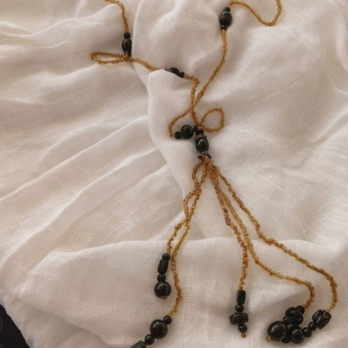 Necklace with black and beige stones like new