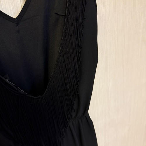 Pink Woman black jumpsuit with open back
