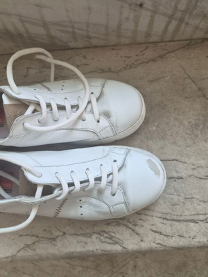 Fluchos sneaker white with gold and brown details, like new, size 36