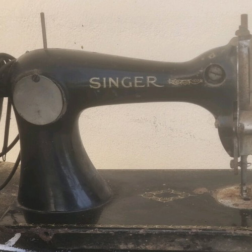 Antique sewing machine used with some rust and not working