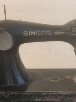 Antique sewing machine used with some rust and not working
