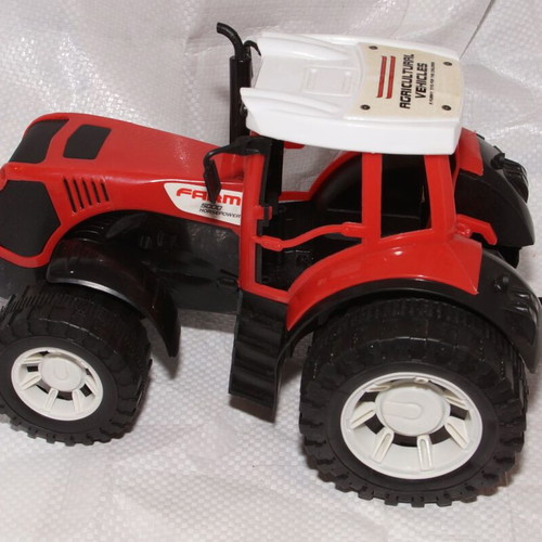 Large plastic tractor used