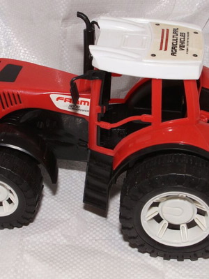Large plastic tractor used