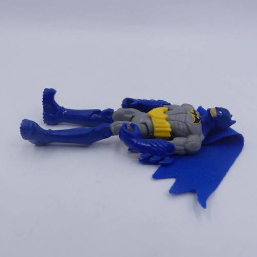 Batman Gotham City Showdown action figure used with 2 red weapons