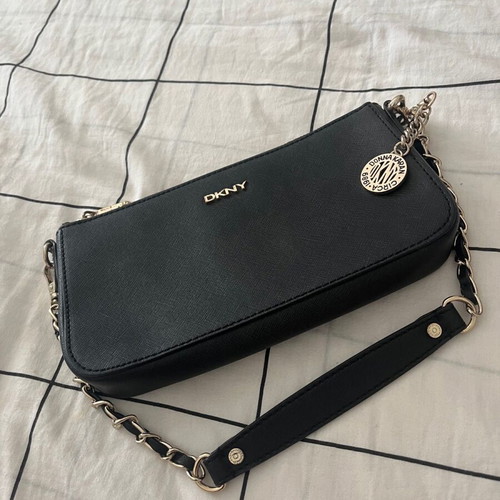 DKNY bag used with large strap