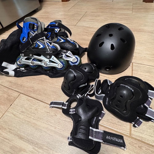 Roller skates set with protective gear like new, kids size xs 29-32