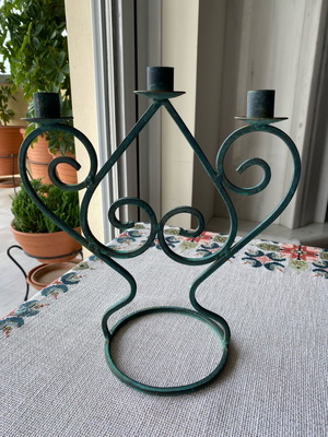 Vintage wrought iron candle holder used, year 1993 with minor oxidations