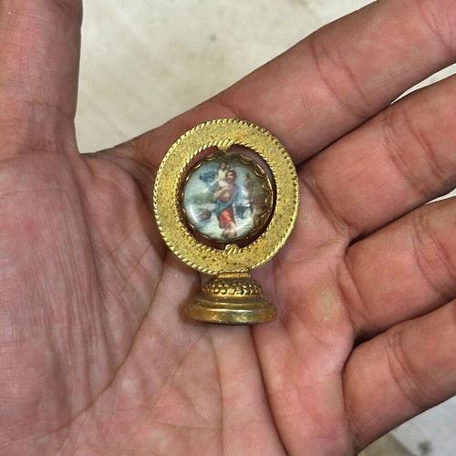 Vintage bronze magnet with double-sided Christian icon used
