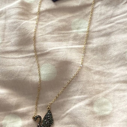 Gold-tone swan pendant necklace