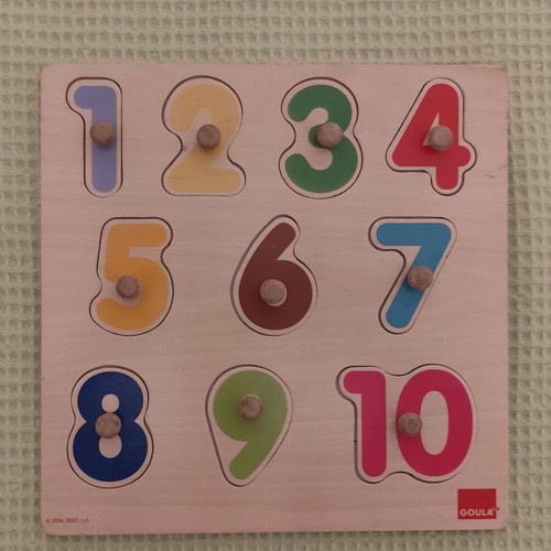 Wooden and paper puzzles used for children