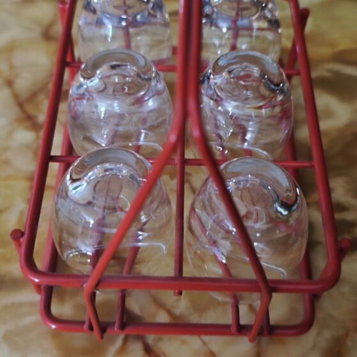 Vintage liqueur set with 6 glasses and red metal holder like new