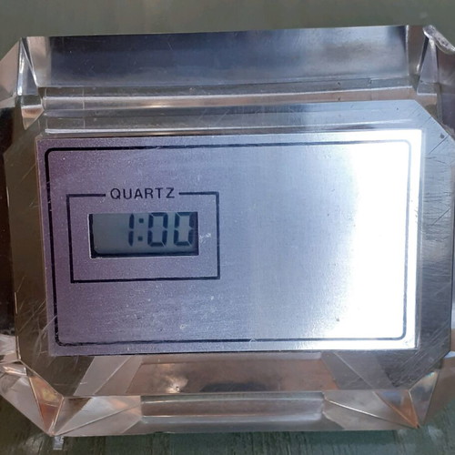 Digital tabletop clock used, plastic