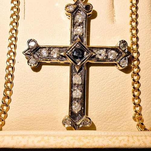Gold cross 18K with 14K chain used with diamonds and sapphire