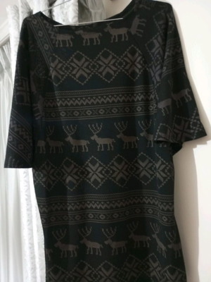 Tunic black with grey-brown patterns used, in good condition