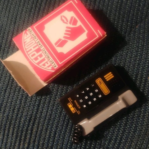 Vintage telephone lighter like new with box