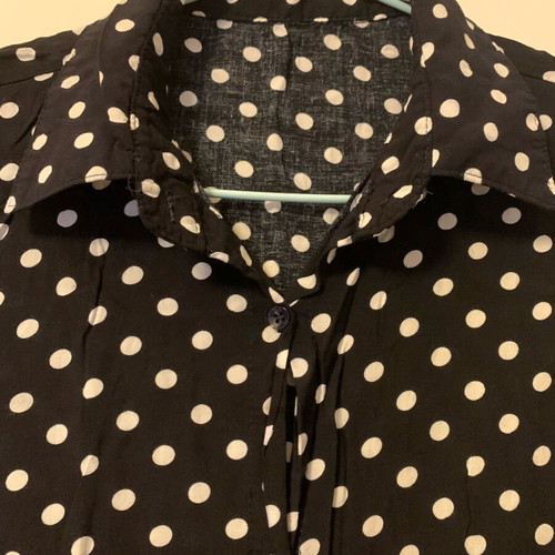 Polka dot sleeveless shirt with tie bottom, size small, like new