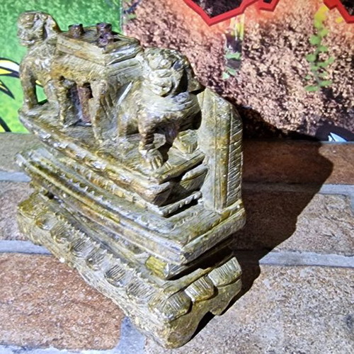 Antique carved stone decoration of Asian temple used