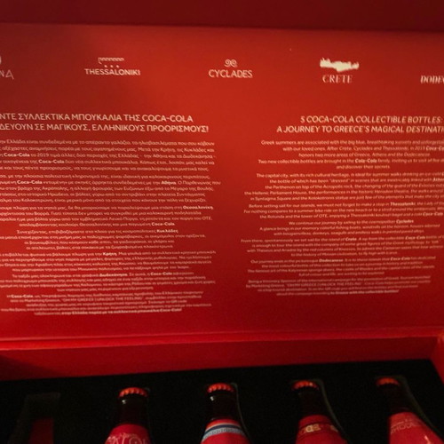 Collectible bottles and book 50 years Coca Cola new