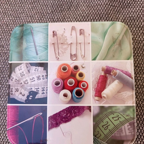 Sewing kit metal box with useful sewing items used