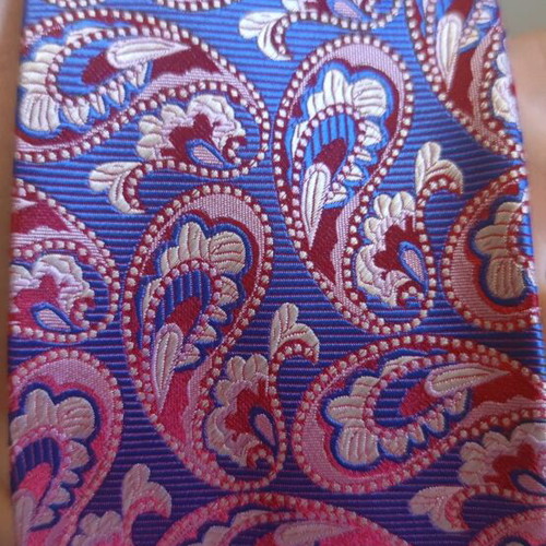Silk tie new with unique paisley pattern, burgundy and blue