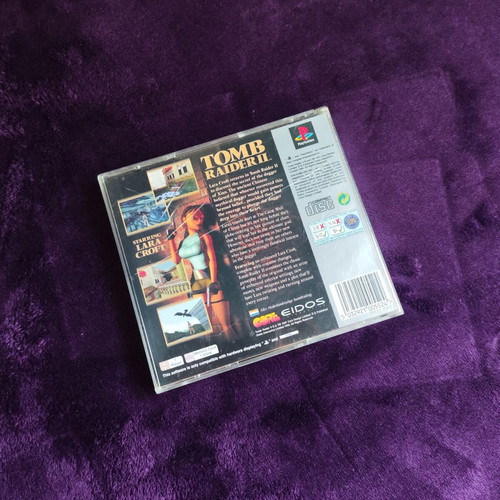 Tomb Raider II PS1 Platinum Edition game used, case with cracks