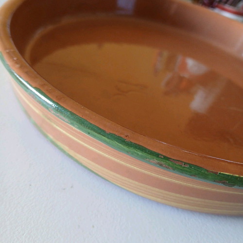Clay platter with painted border like new