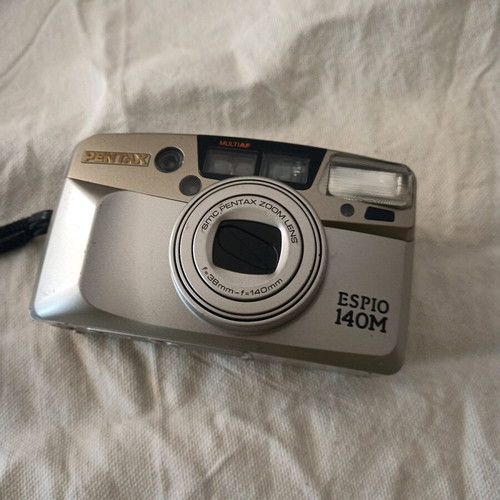 Pentax Espio 140 used camera with faint LCD indicators