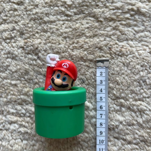 Mario figure in green Warp pipe used