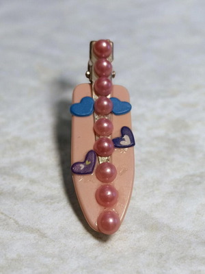 Handmade hair clips with white and pink pearls, blue and black