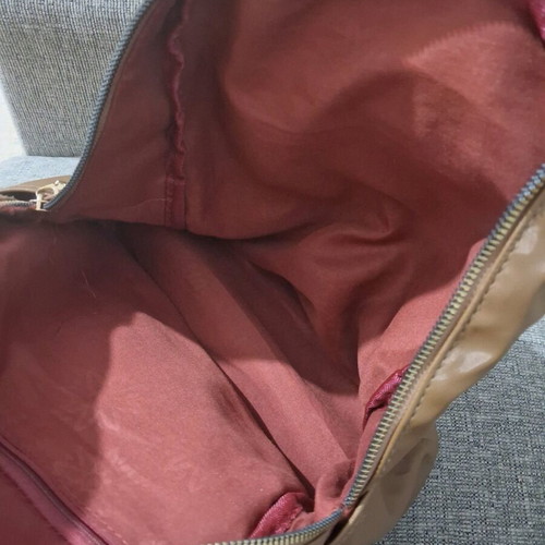 Backpack like new brown with gold zippers