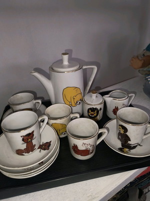 Collectible tea set with animals like new