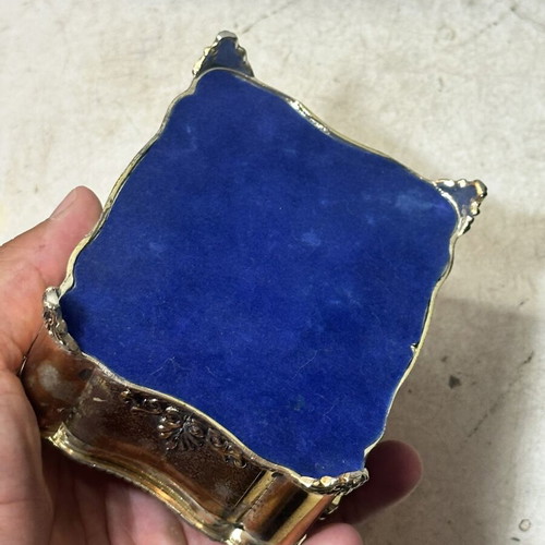 Vintage metal jewelry box with blue scarab, used